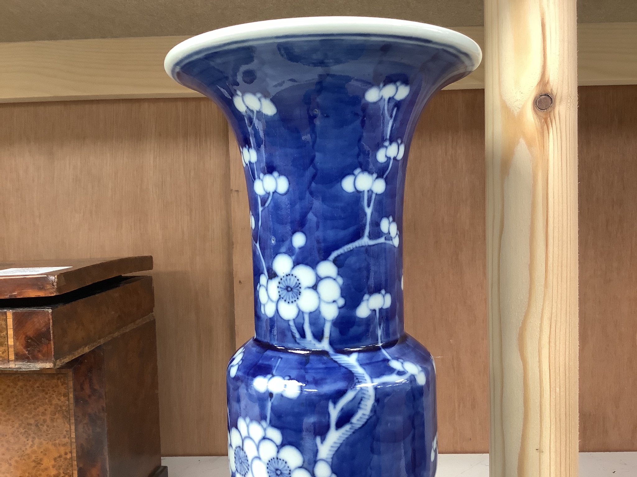 A Chinese blue and white prunus decorated gu vase, 26.5cm